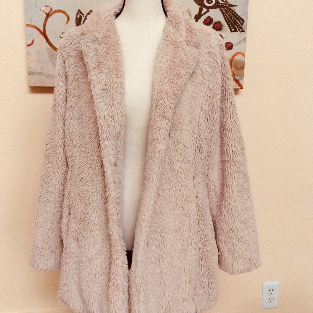 Furry coat with cheetah print lining